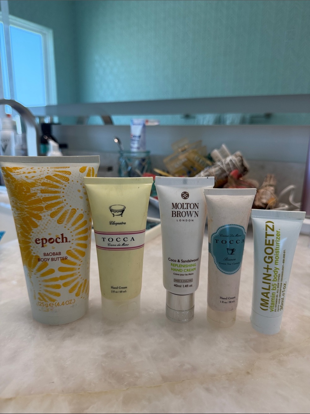 Assortment of Hand and Body Creams from Tocca, Molton Brown, Malin+ Goetz, Epoch